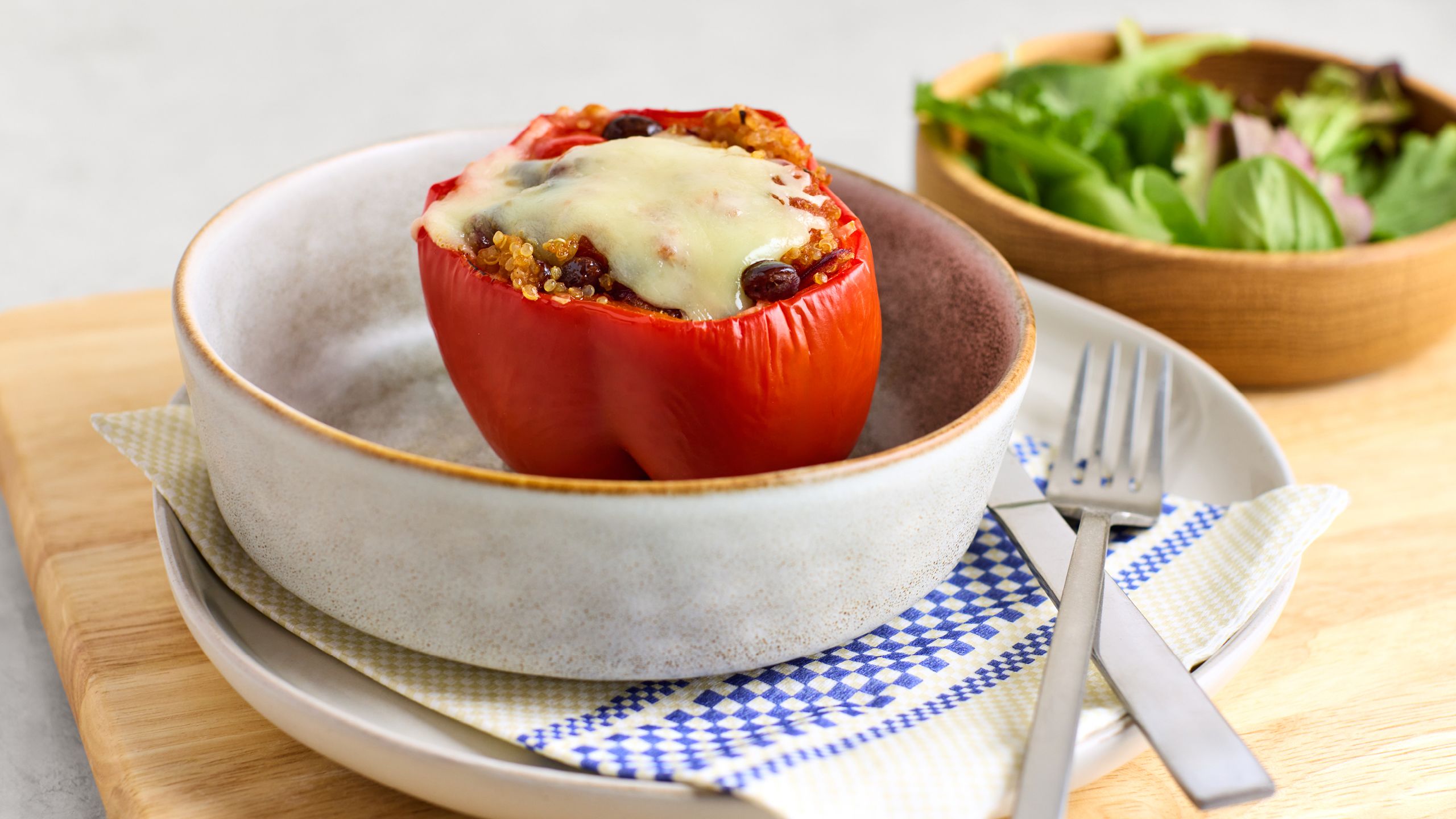 Photo of one serving of Quinoa and Black Bean-Stuffed Pepper