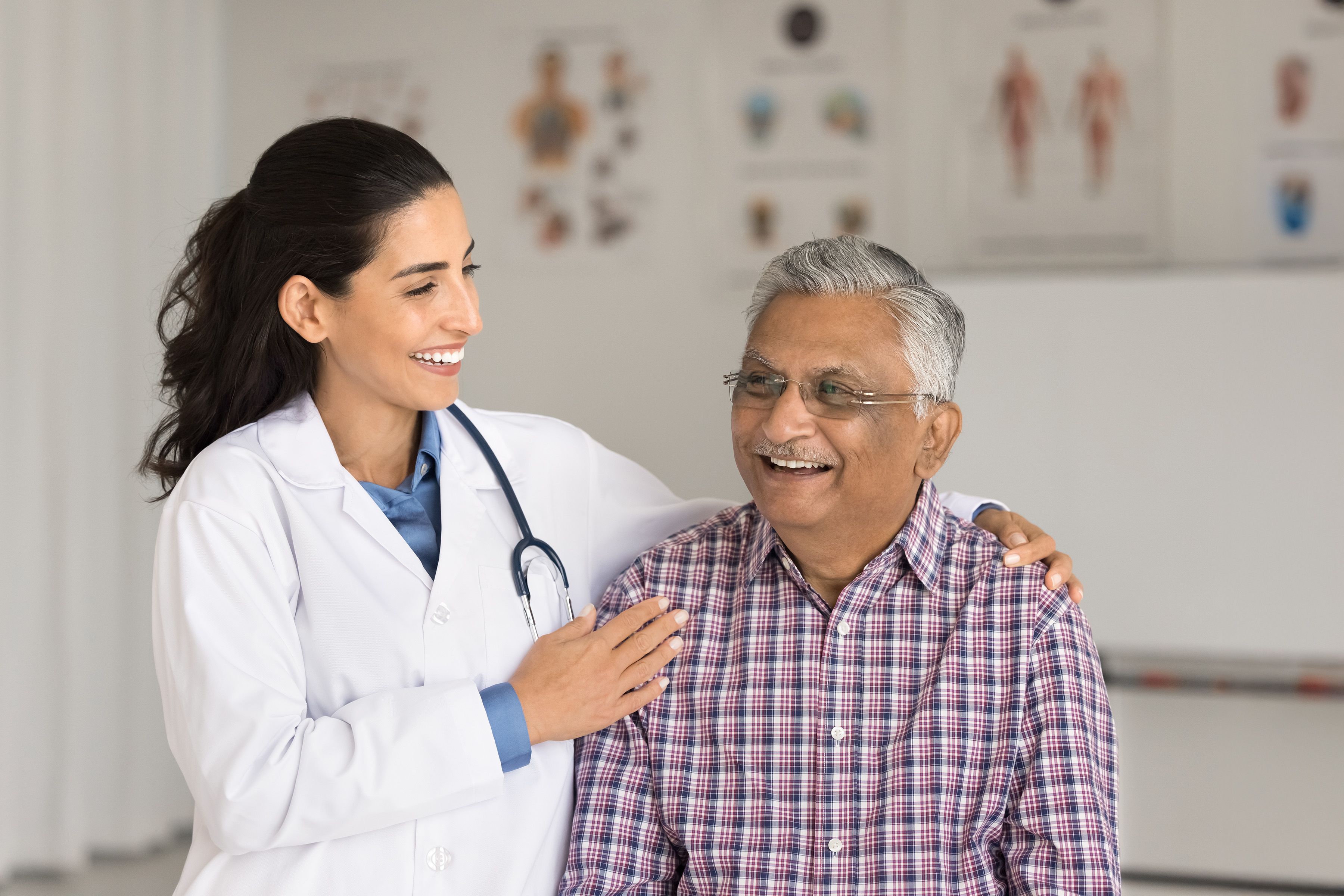Photo of a man consulting with a doctor at a clinic